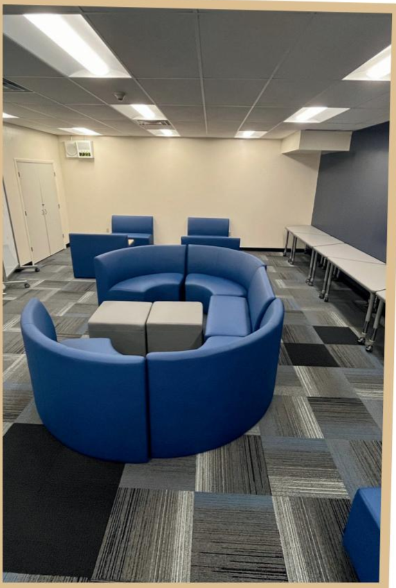 Blue couches in renovated lounge area