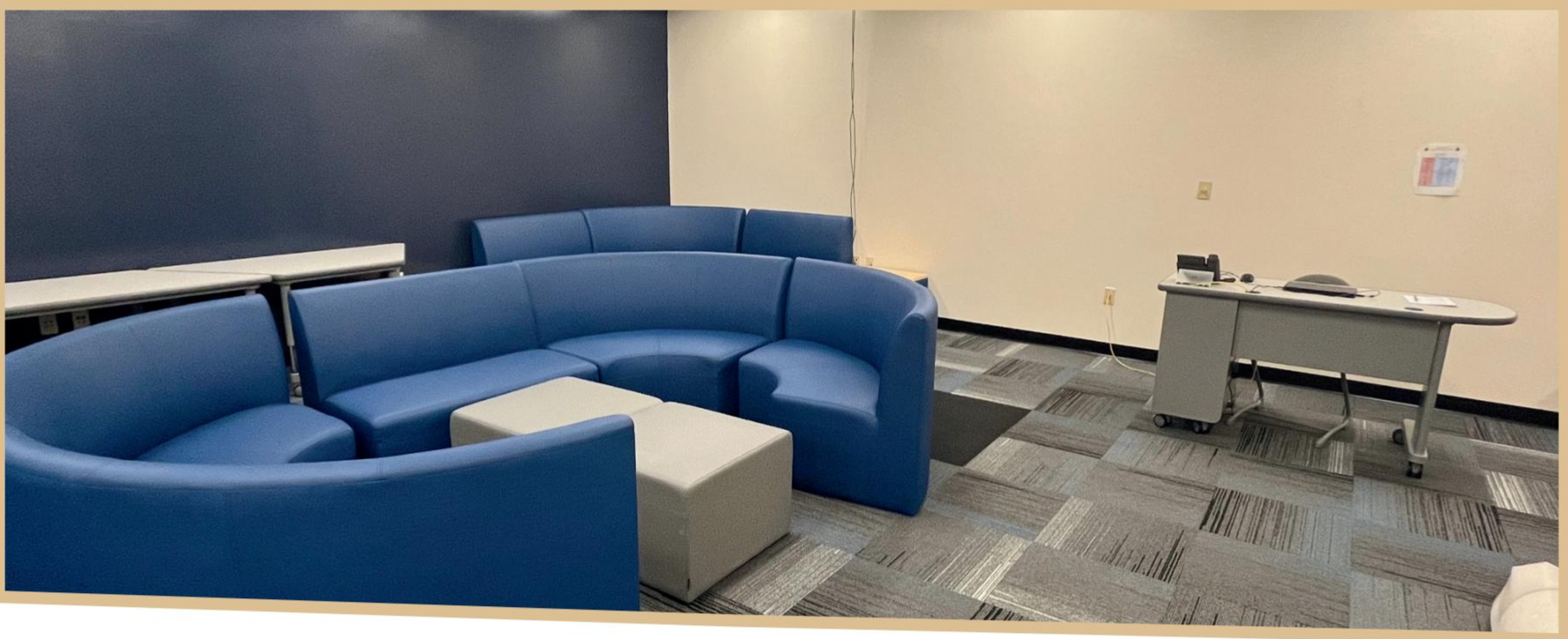 Renovated collaboration space with blue curved couches